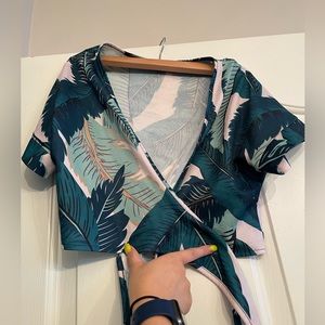 Tropical/floral two piece crop top with high waisted pants.